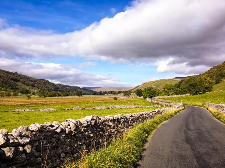 A road winding through the Yorkshire Dales
